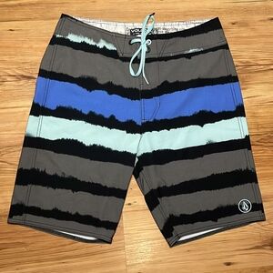 Volcom Blue and Black Board Shorts with Striking Stripes